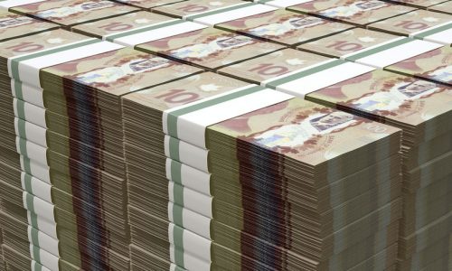 Canadian Dollar Notes Bundles Stack A stack of bundled Canadian Dollar banknotes on an isolated background