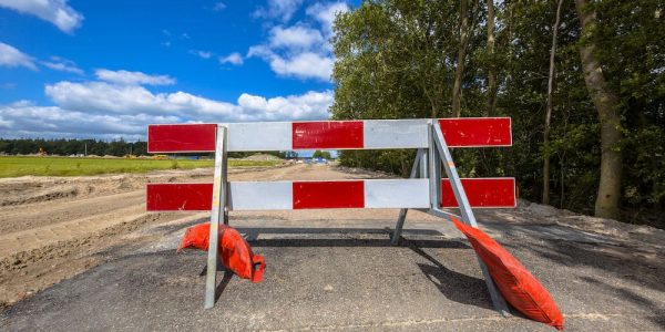 No entry roadblock Red and white no entry roadblock on a small asphalt country road